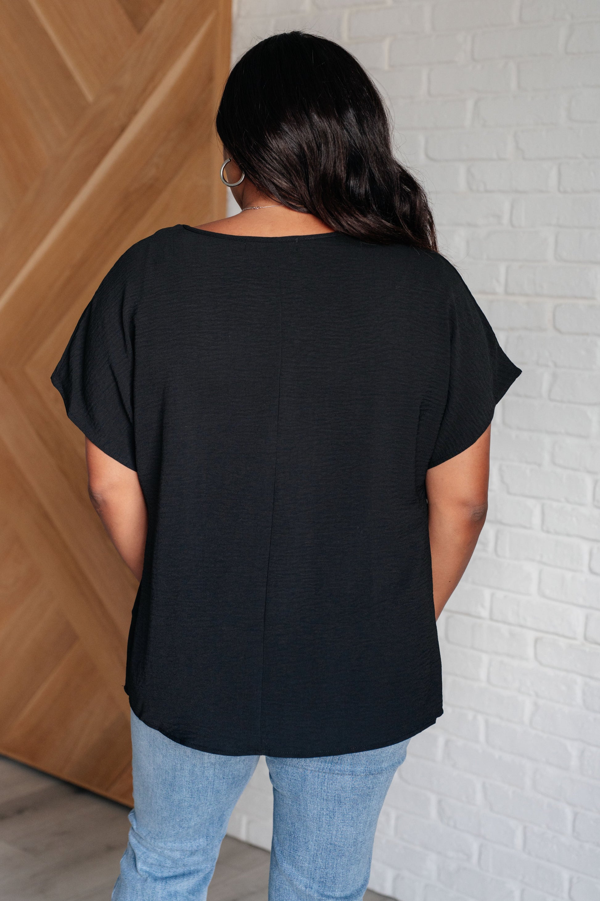 Frequently Asked Questions V-Neck Top in Black - Southern Divas Boutique