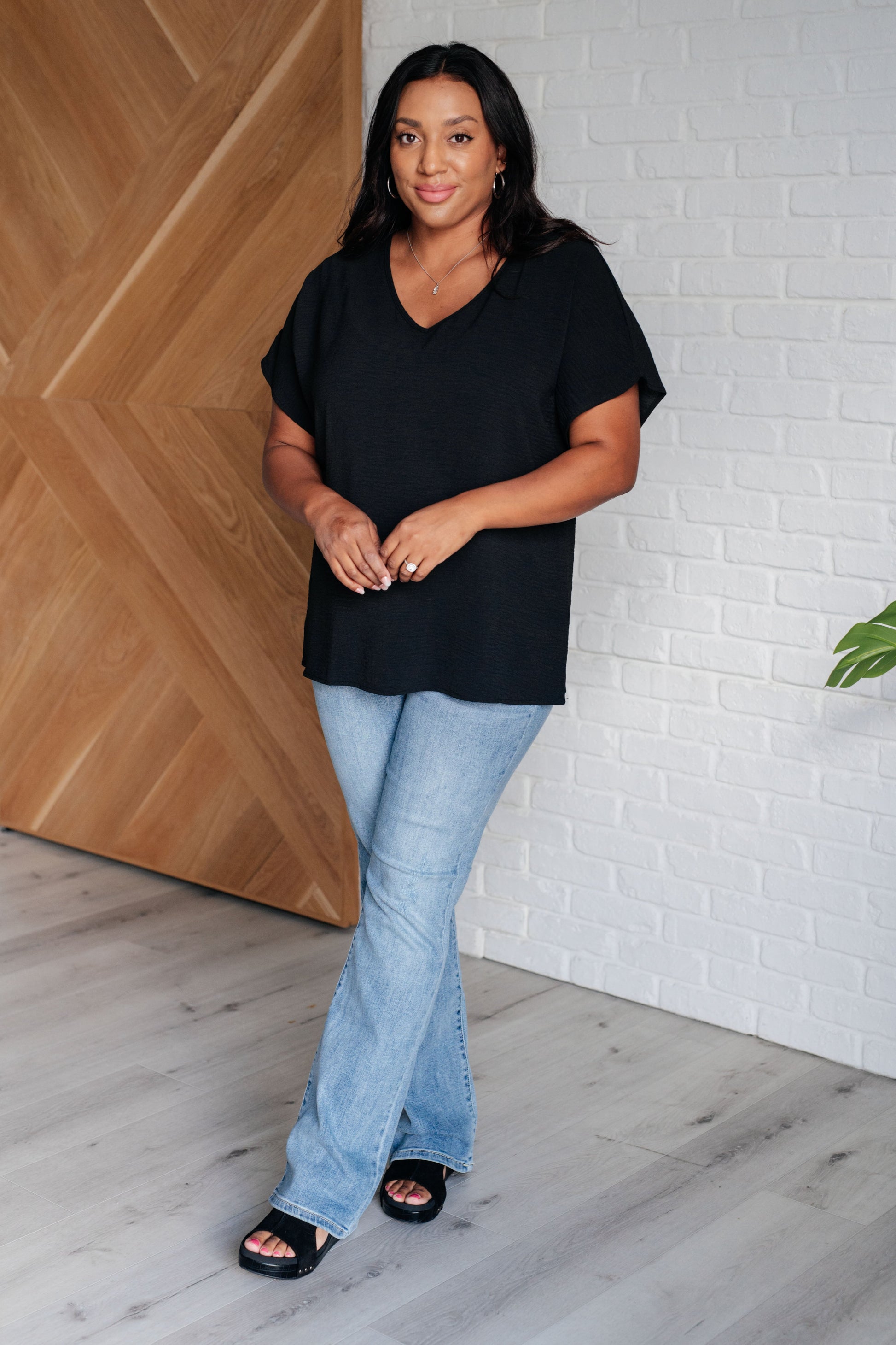 Frequently Asked Questions V-Neck Top in Black - Southern Divas Boutique