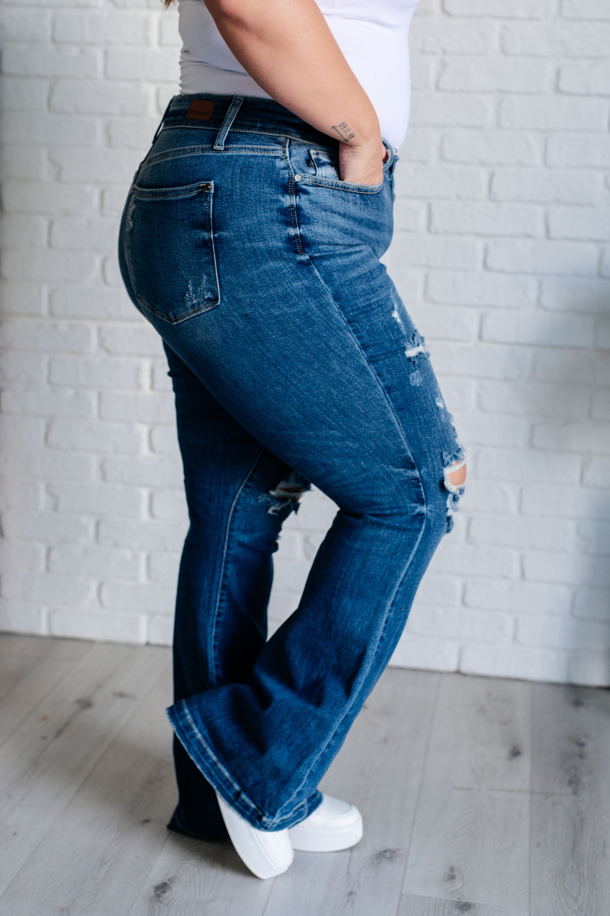 Gabriella Mid Rise Distressed Button Fly Flare Jeans - Southern Divas Boutique
