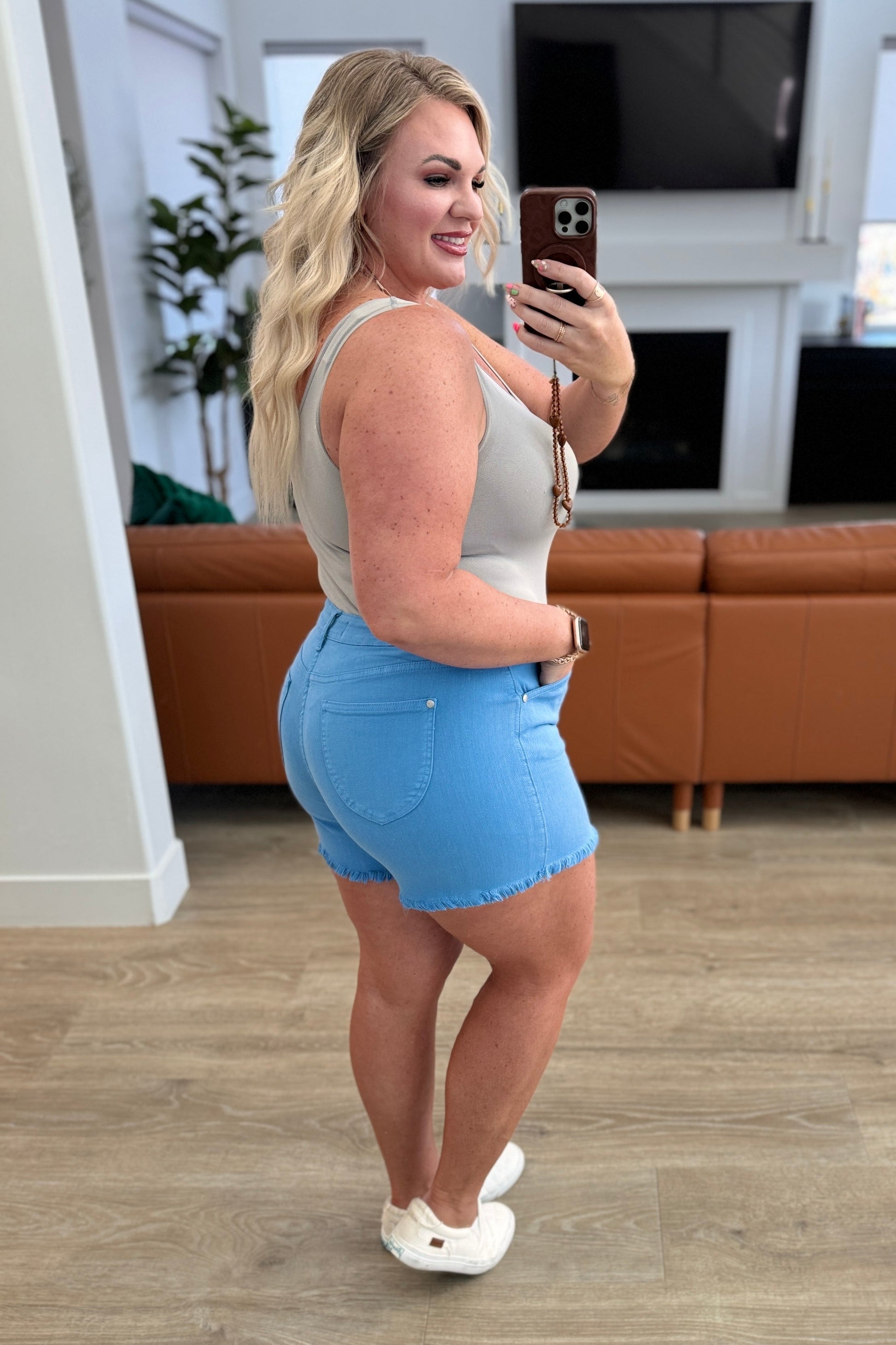 Celeste Mid Rise Shield Pocket Cutoff Shorts in Sky Blue - Southern Divas Boutique
